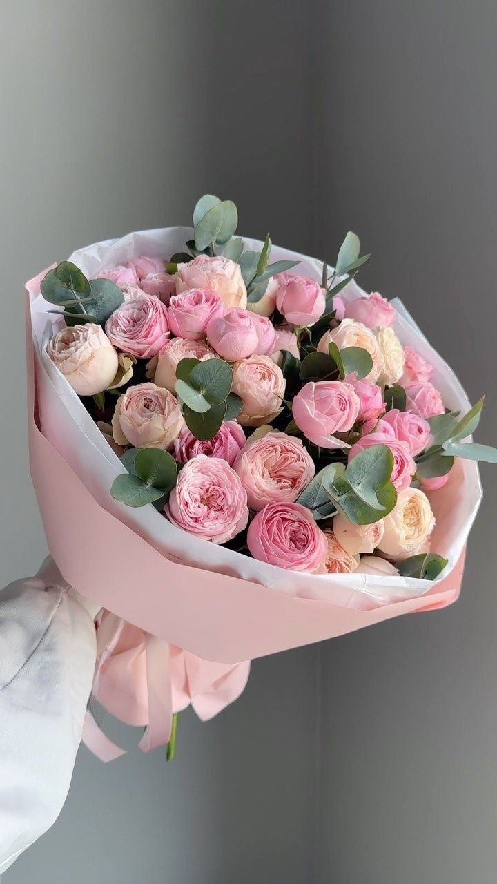 Bouquet of Peony roses with eucalyptus